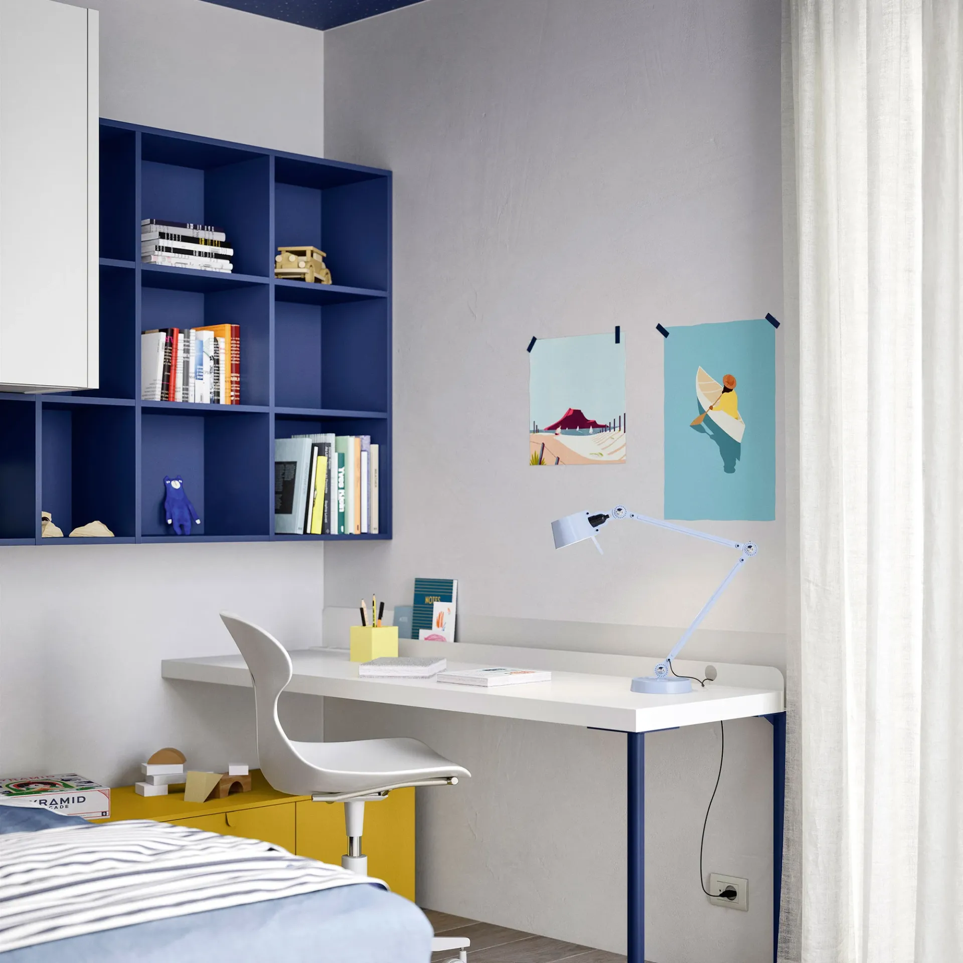 Libreria sospesa Luce Nidi blu sopra la scrivania