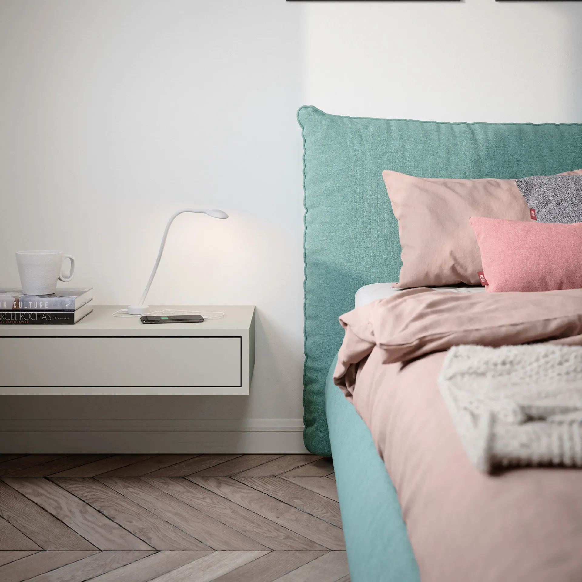 Comodino Luce Nidi bianco sospeso accanto al letto rosa