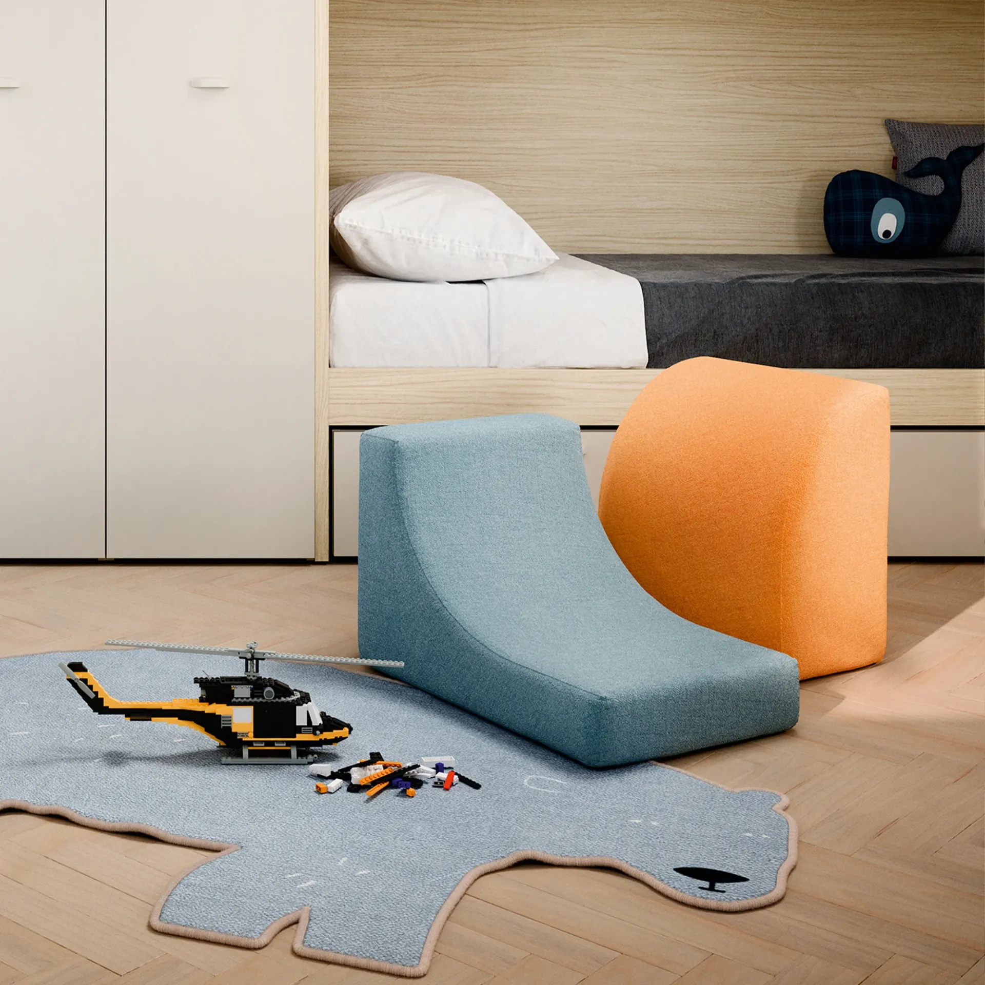 Pouf Klove Nidi azzurro e arancio in cameretta