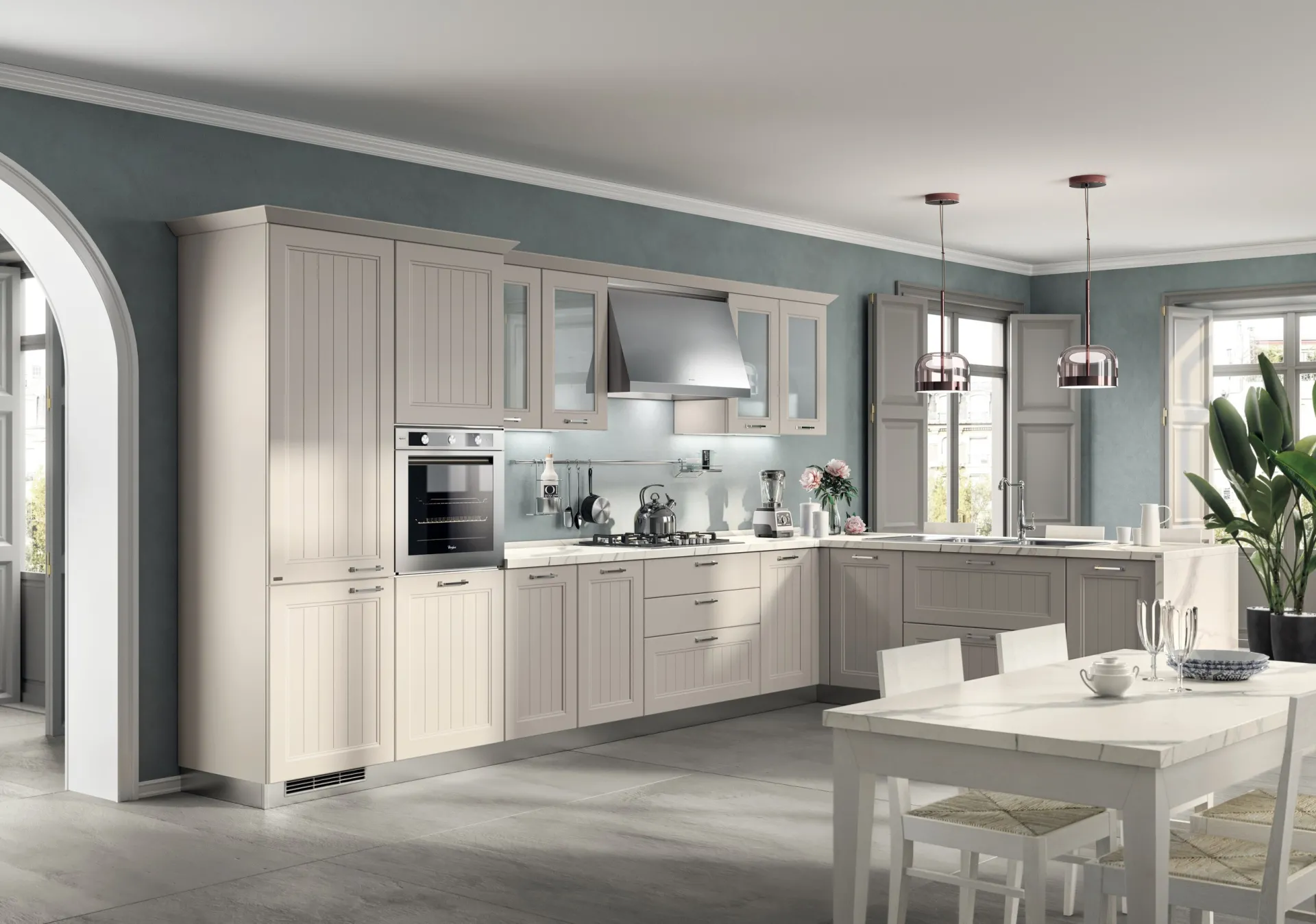 Cucina Colony Scavolini ad angolo con ante a telaio dogate e tavolo da pranzo bianco