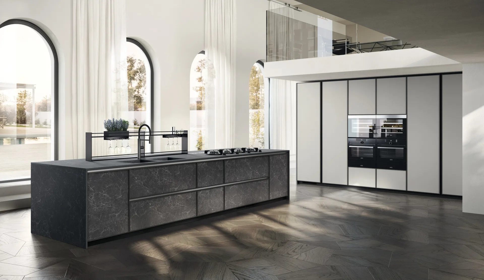 Cucina Jeometrica Scavolini con isola in gres Nero Greco e colonne chiare con telaio Antracite