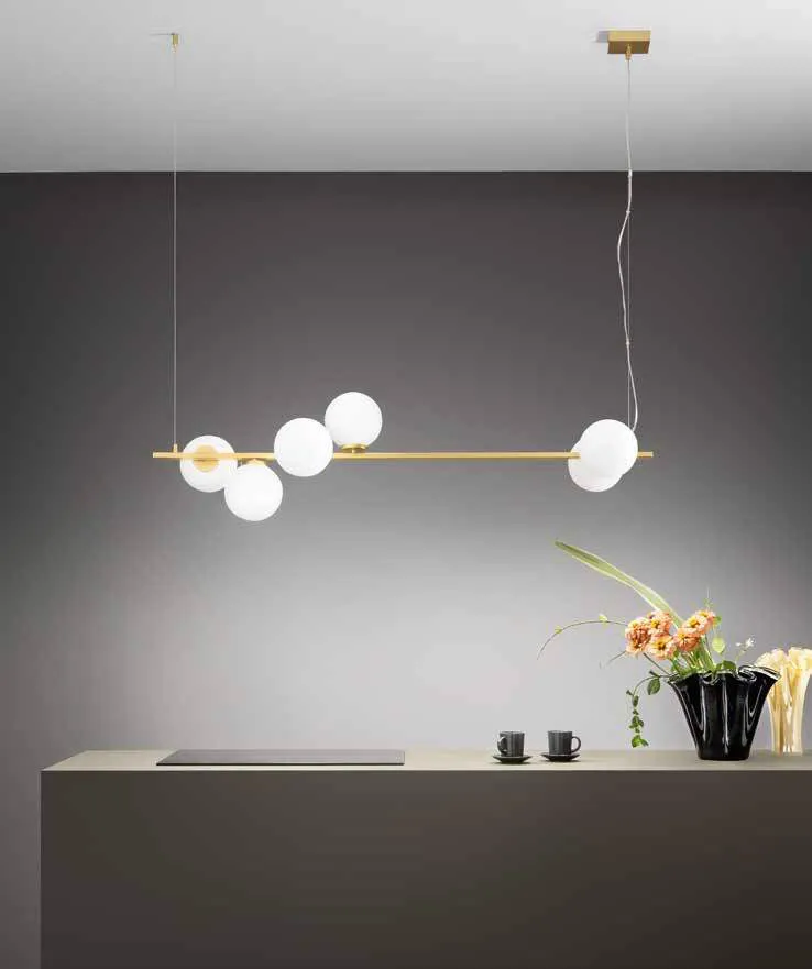 Sospensione lineare Enoire Fan Europe oro sopra un piano