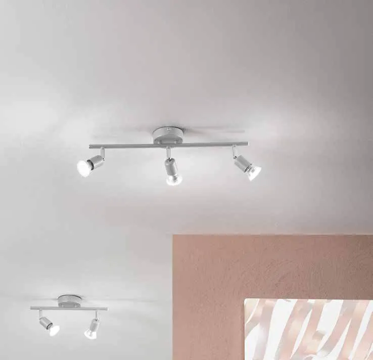 Faretti Cooper Fan Europe silver a barra su parete grigia