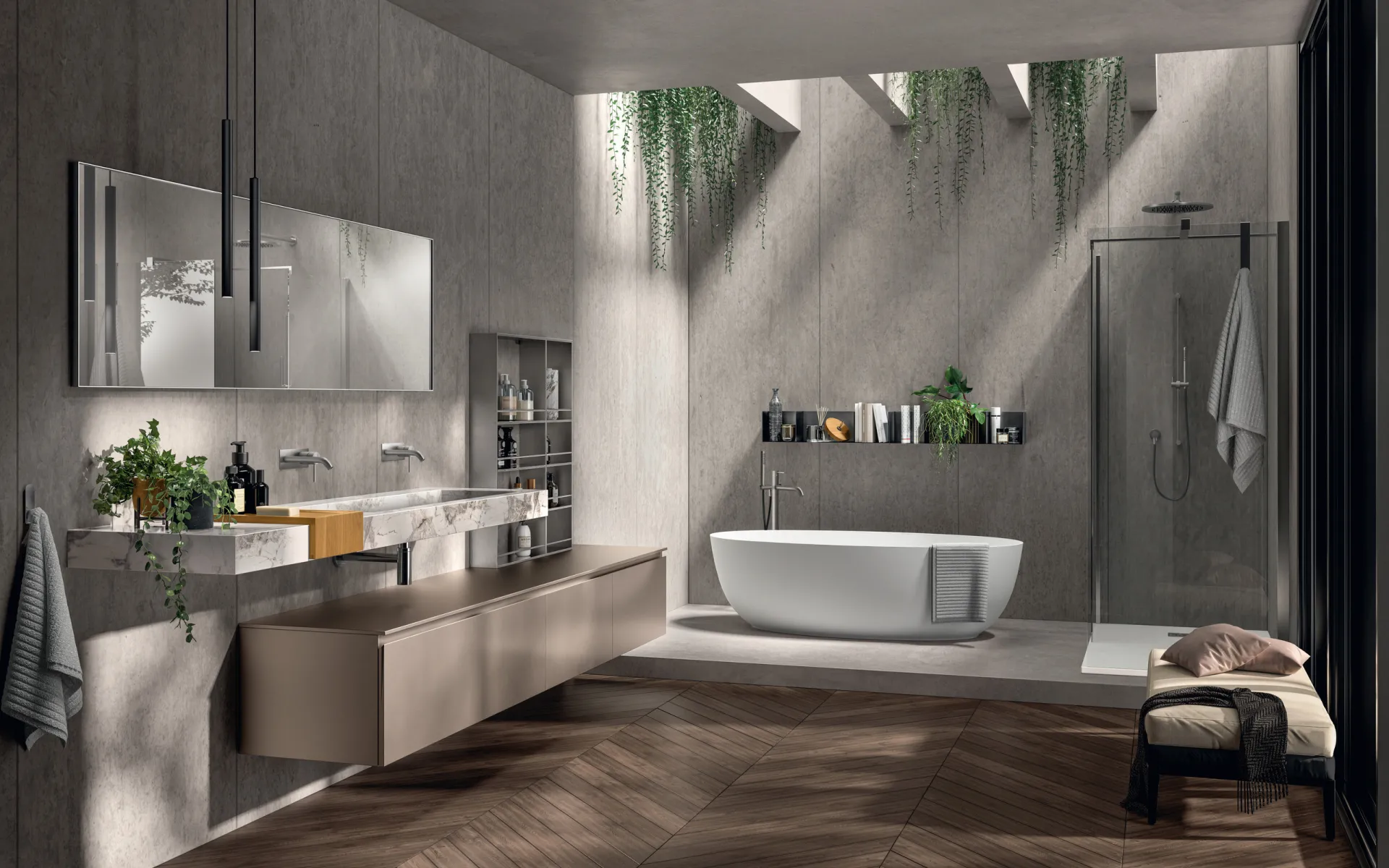 Bagno Rivo Scavolini con lunga base sospesa, doppio lavabo e vasca freestanding in un ambiente con piante