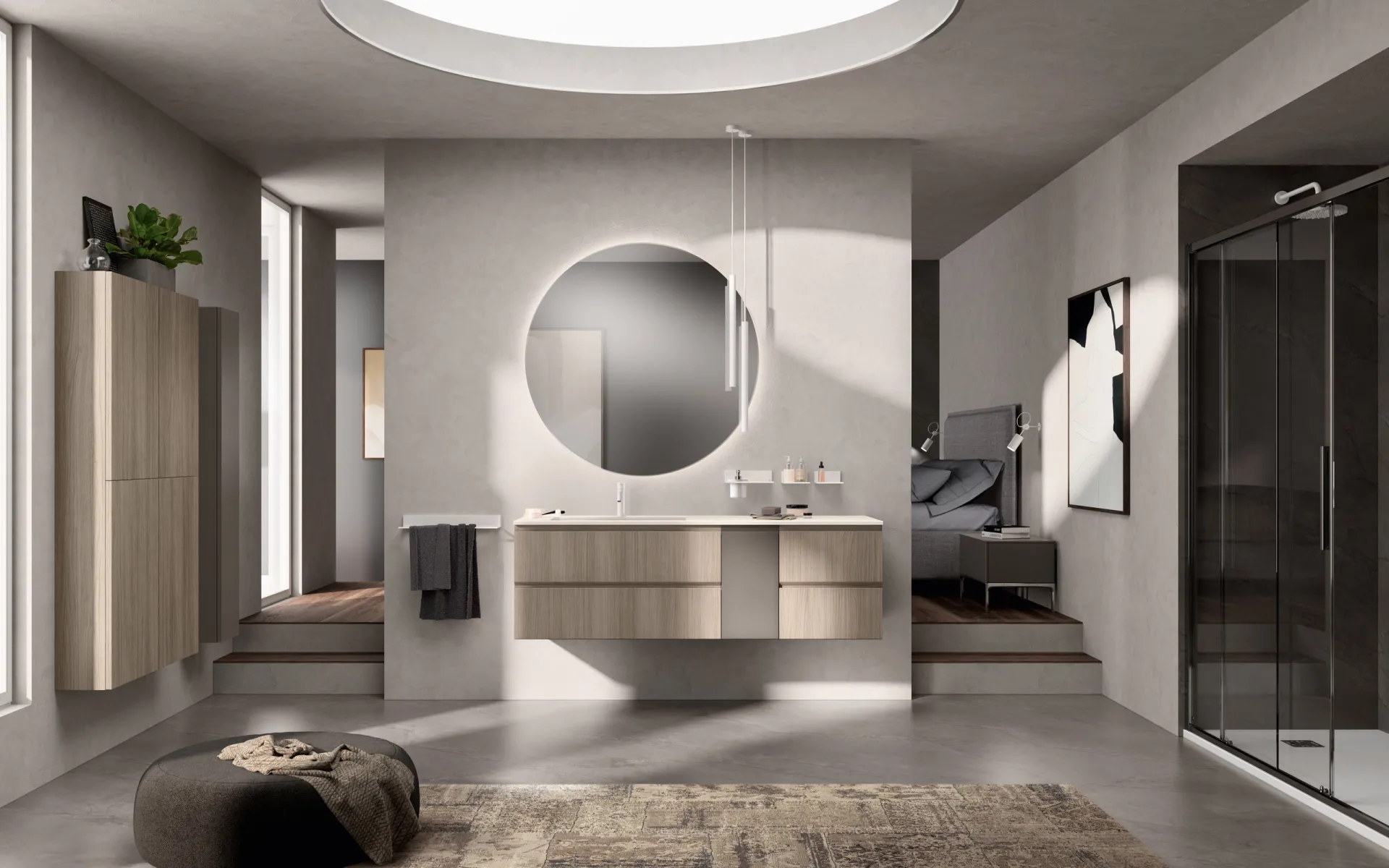Bagno Rivo Scavolini con basi sospese effetto legno, specchio tondo illuminato e colonna coordinata