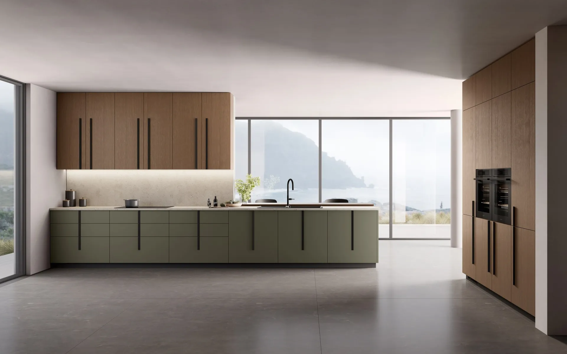 Cucina Stilo Scavolini lineare con basi Verde Minerale, pensili in Rovere Malto e maniglie tonde verticali