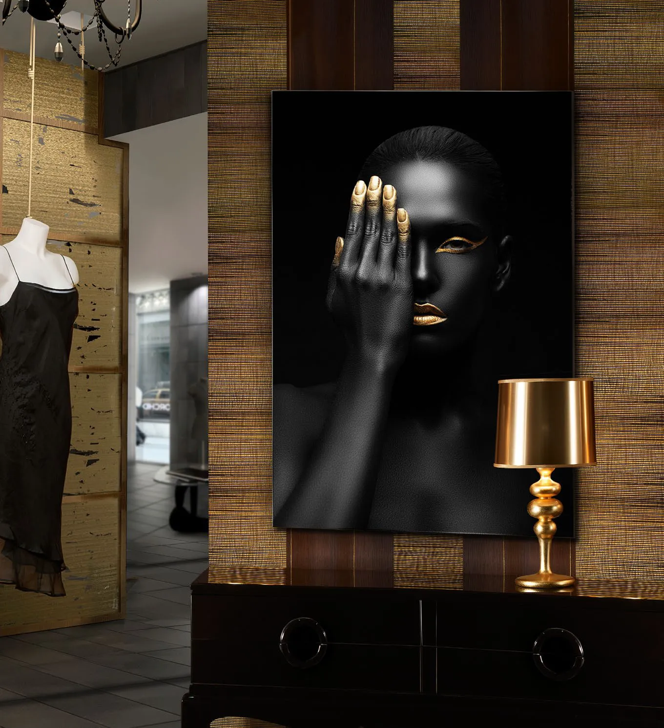 Quadro fotografico Oro Negro Schuller con volto nero e oro sopra una consolle