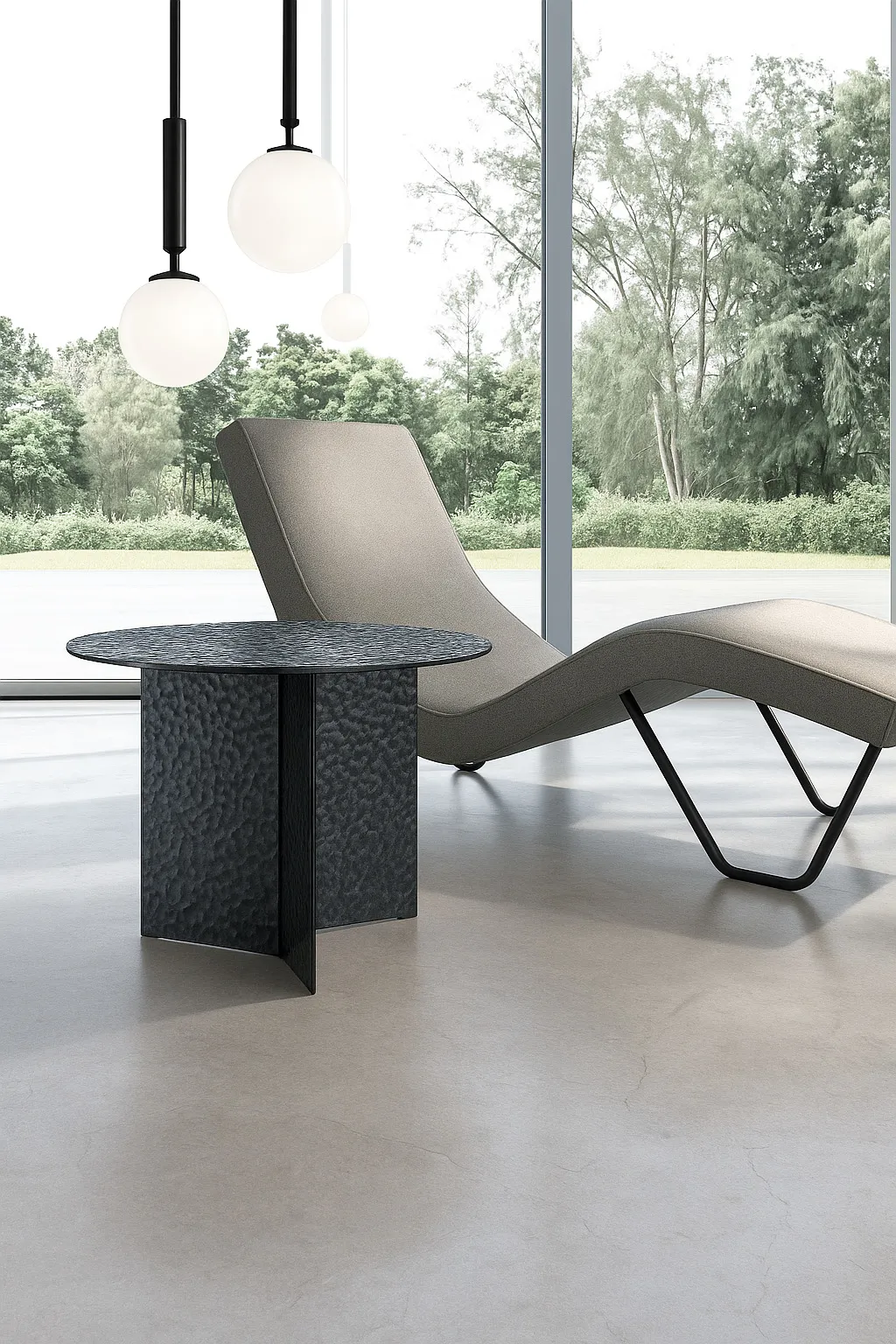 Tavolino Fold piccolo Stones in vetro fumé accanto a una chaise longue
