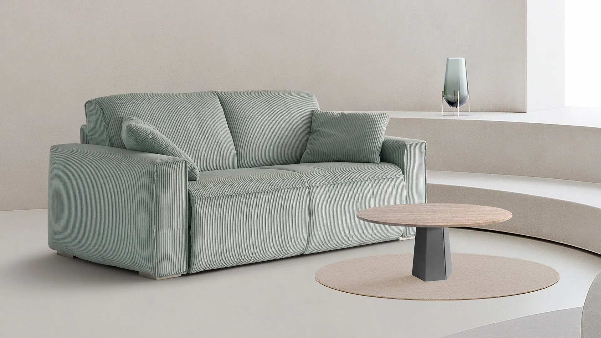 Divano letto Twist Aerre Divani verde chiaro con tavolino rotondo in legno