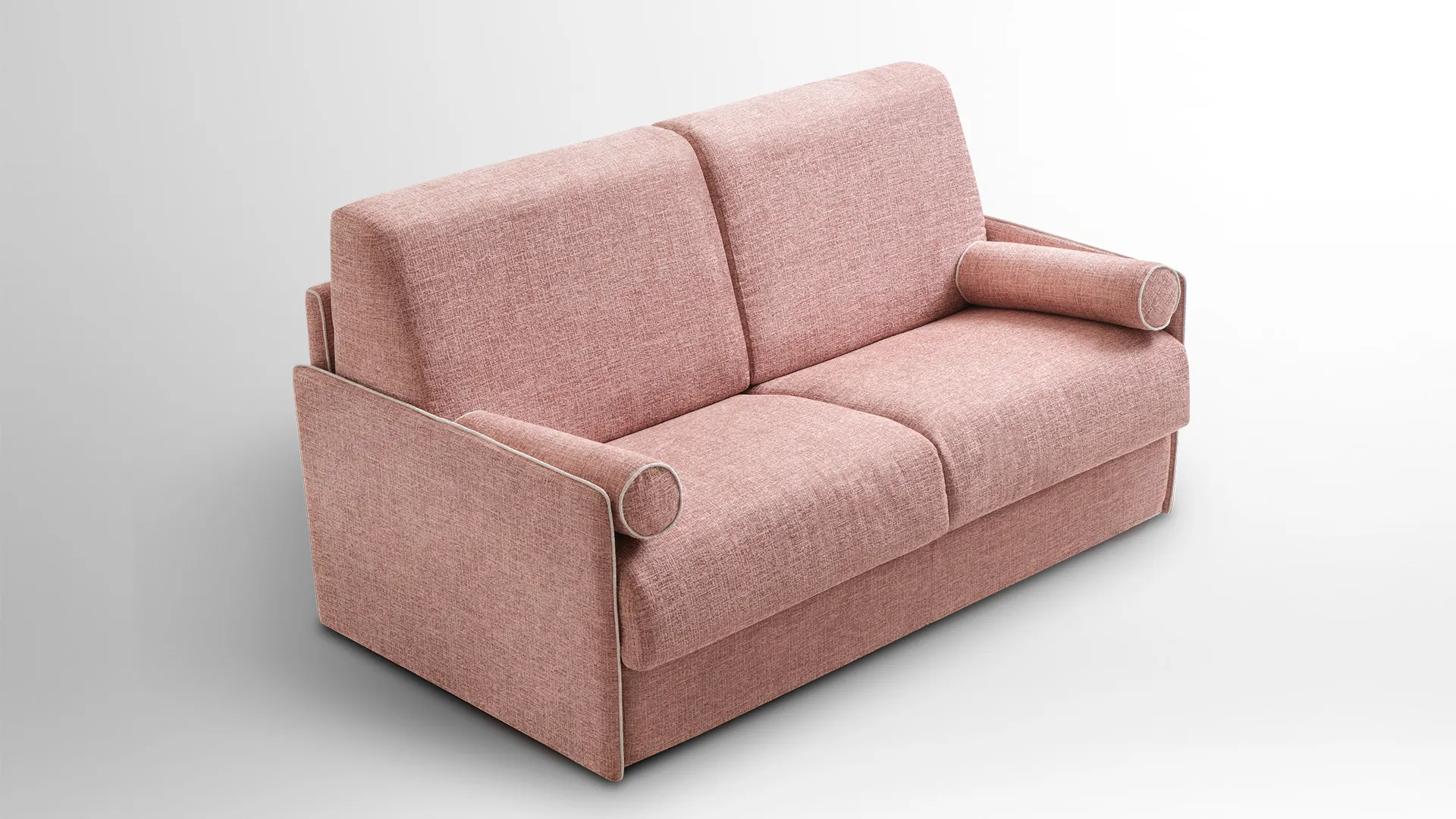 Divano letto Vicky Aerre Divani rosa con cuscini a rullo, visto di tre quarti