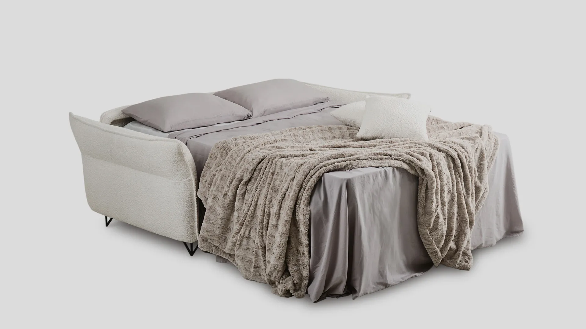 Divano letto Sephora Aerre Divani aperto con plaid e lenzuola grigie