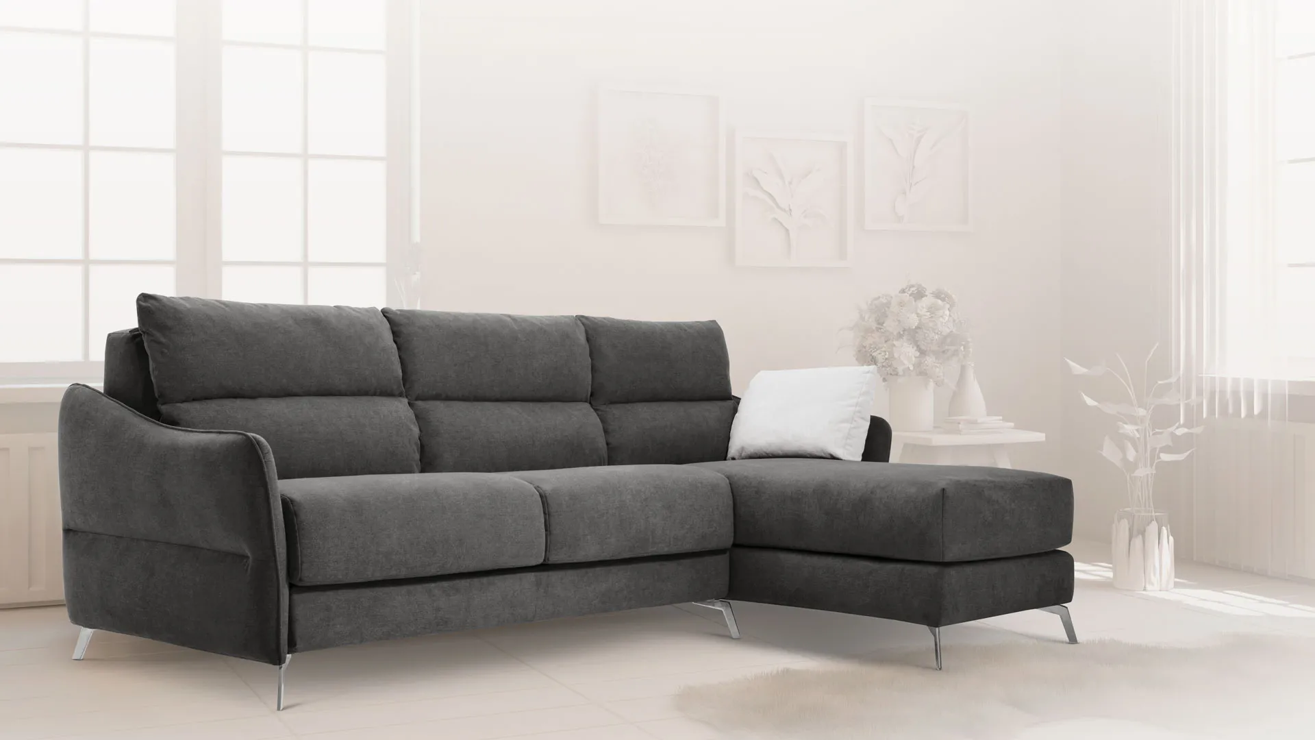 Composizione con chaise longue Comodo Aerre Divani grigio antracite in un soggiorno chiaro