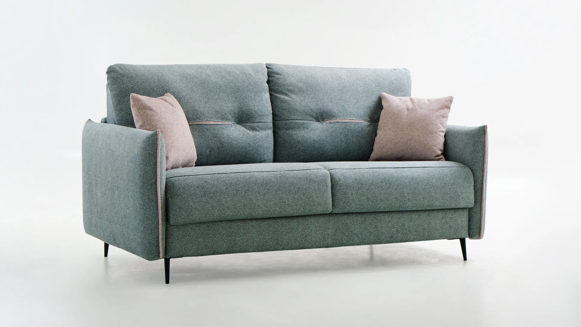 Divano letto Melania Aerre Divani azzurro grigio con cuscini rosa e piedini neri