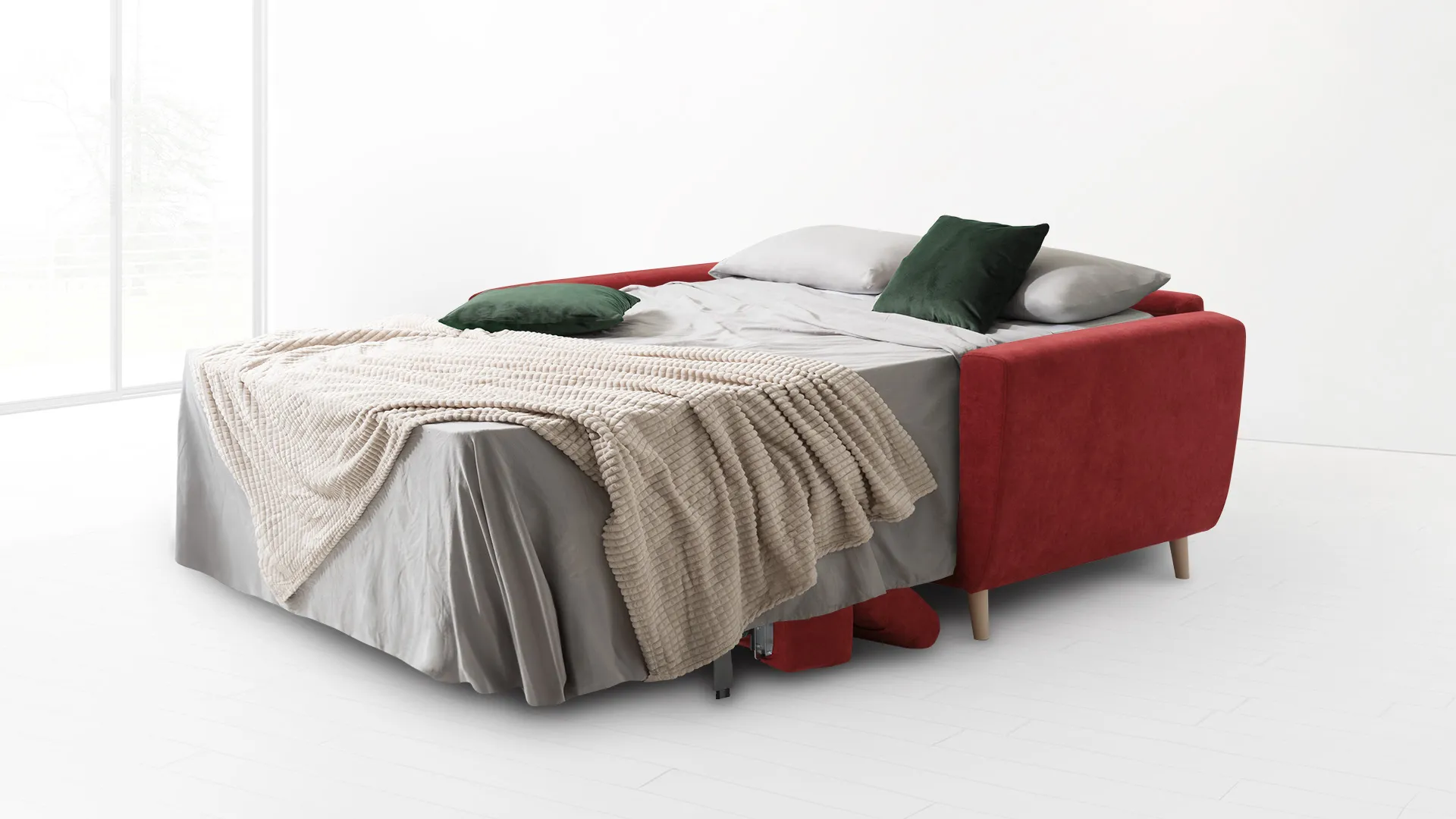 Divano letto Sveva Aerre Divani rosso aperto con lenzuola e plaid