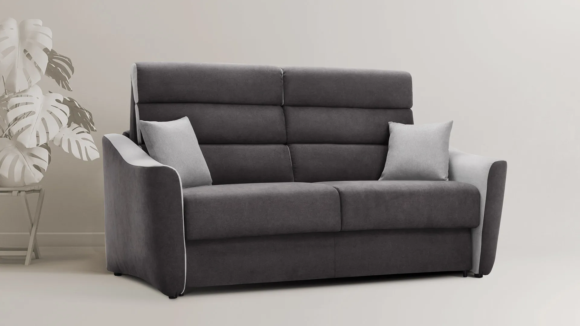 Divano letto Bellini Aerre Divani grigio antracite con schienale a fasce e cuscini grigi