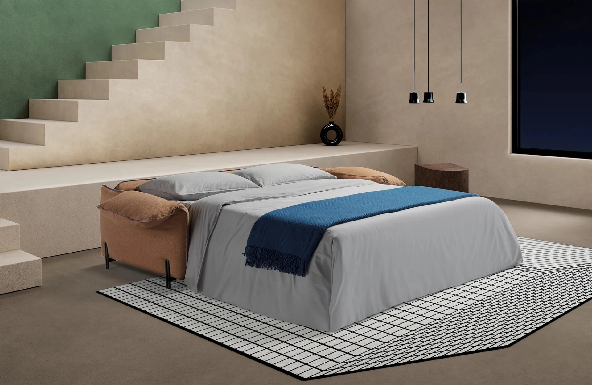Divano letto Cloud Dienne aperto con coperta blu ai piedi della scala