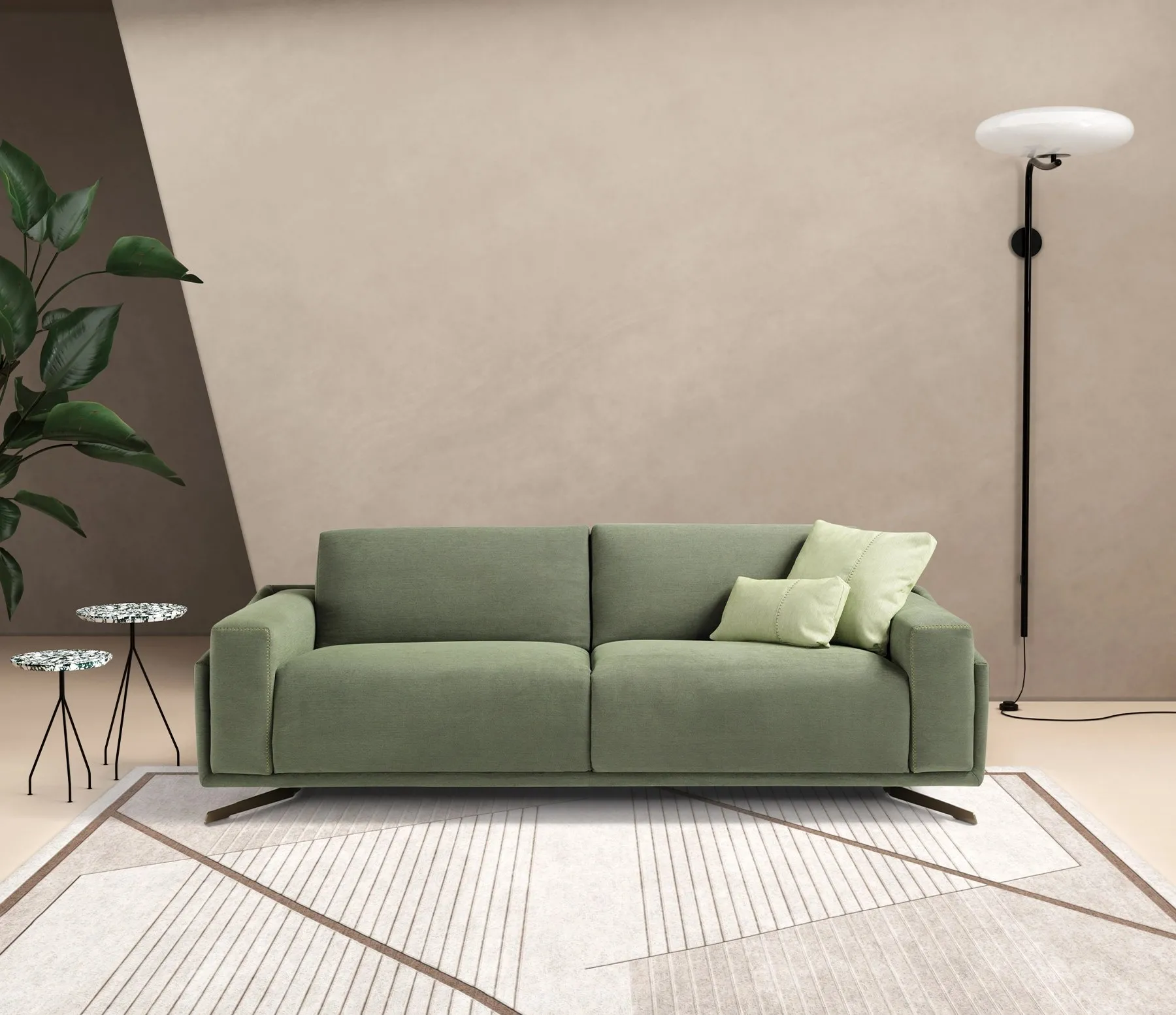 Divano letto Space Dienne di fronte in un ambiente con pianta e lampada