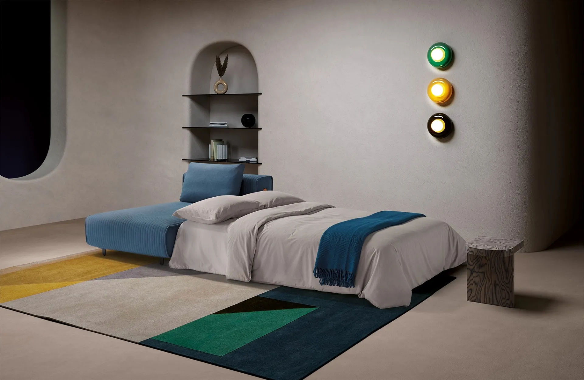 Divano letto trasversale Link Dienne aperto con coperta blu