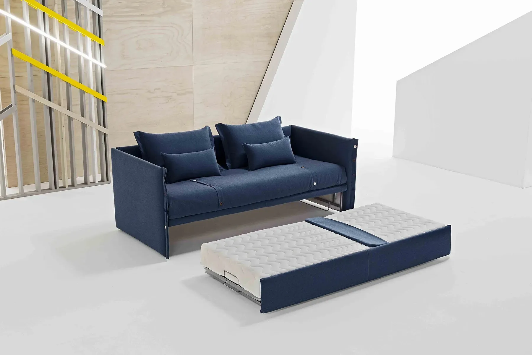 Divano letto Iceberg Dienne con il secondo letto estratto dal basso