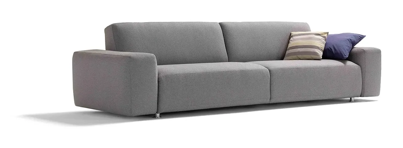 Divano letto Cross Dienne di tre quarti con cuscini a righe