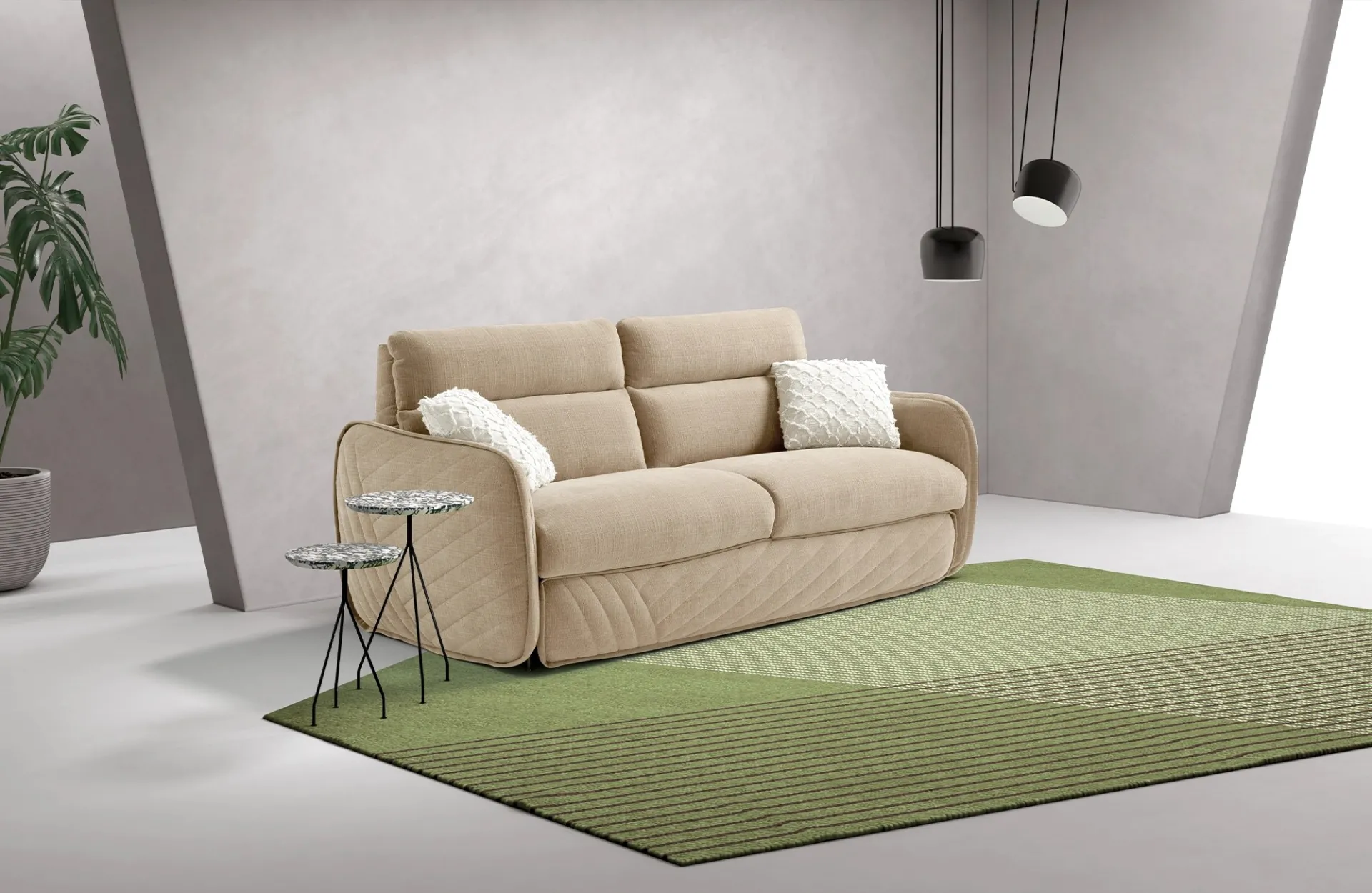 Divano letto Moon Plus Dienne beige con schienale alto su un tappeto verde a righe
