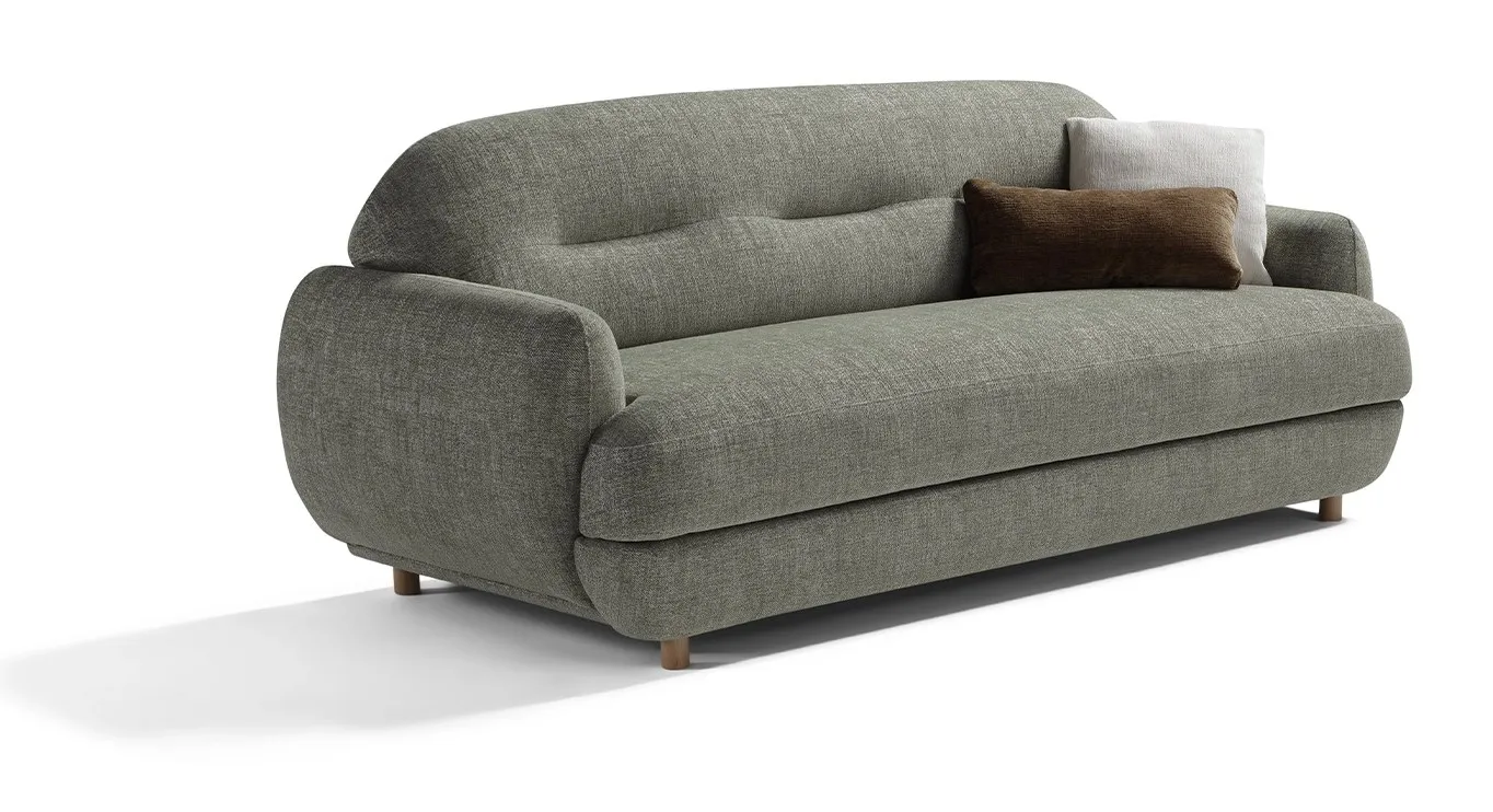 Divano letto Plum Dienne di tre quarti con i bottoni dello schienale e i piedini in legno