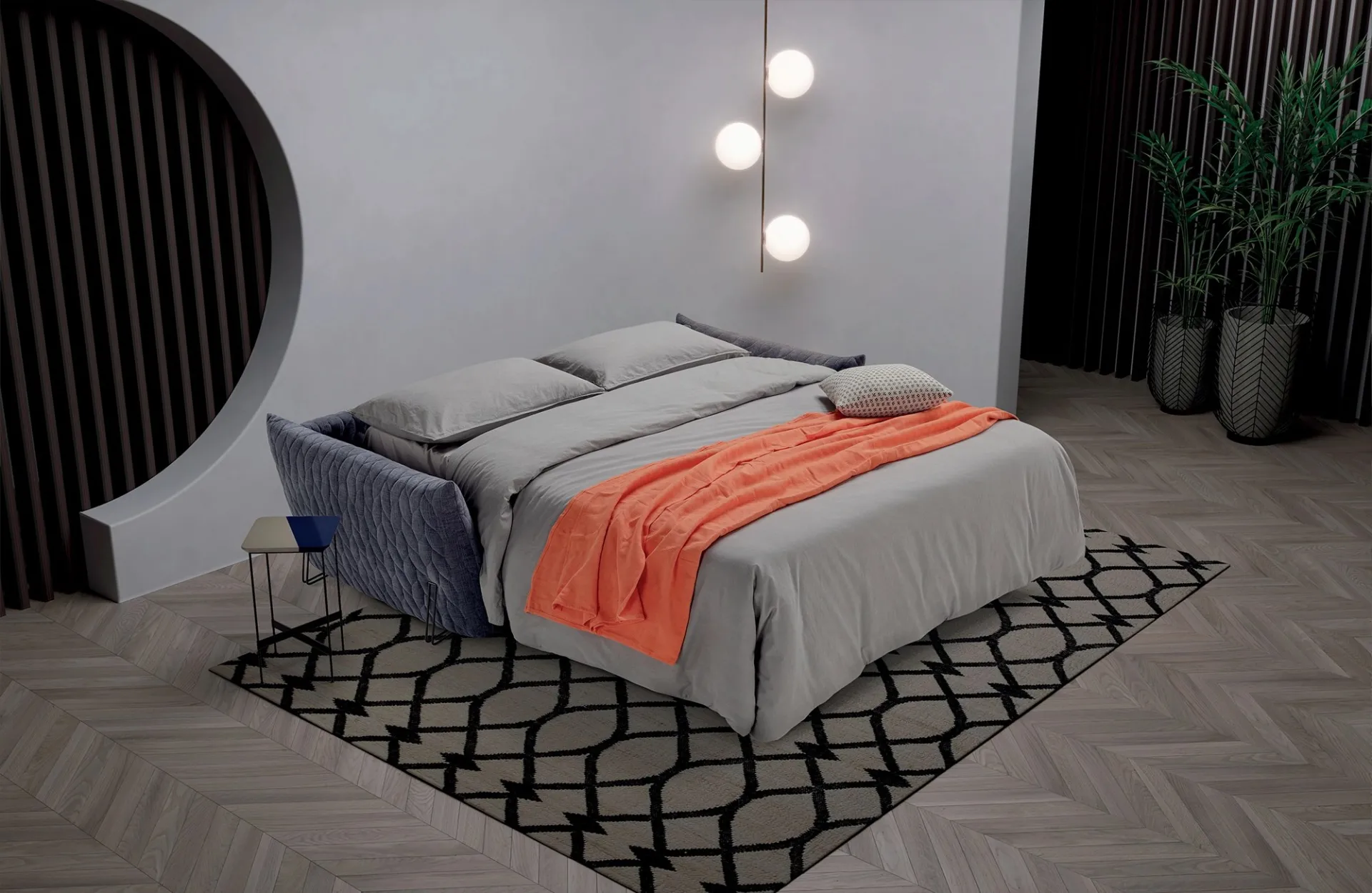 Divano letto Smooth Dienne aperto con lenzuola grigie e plaid arancione