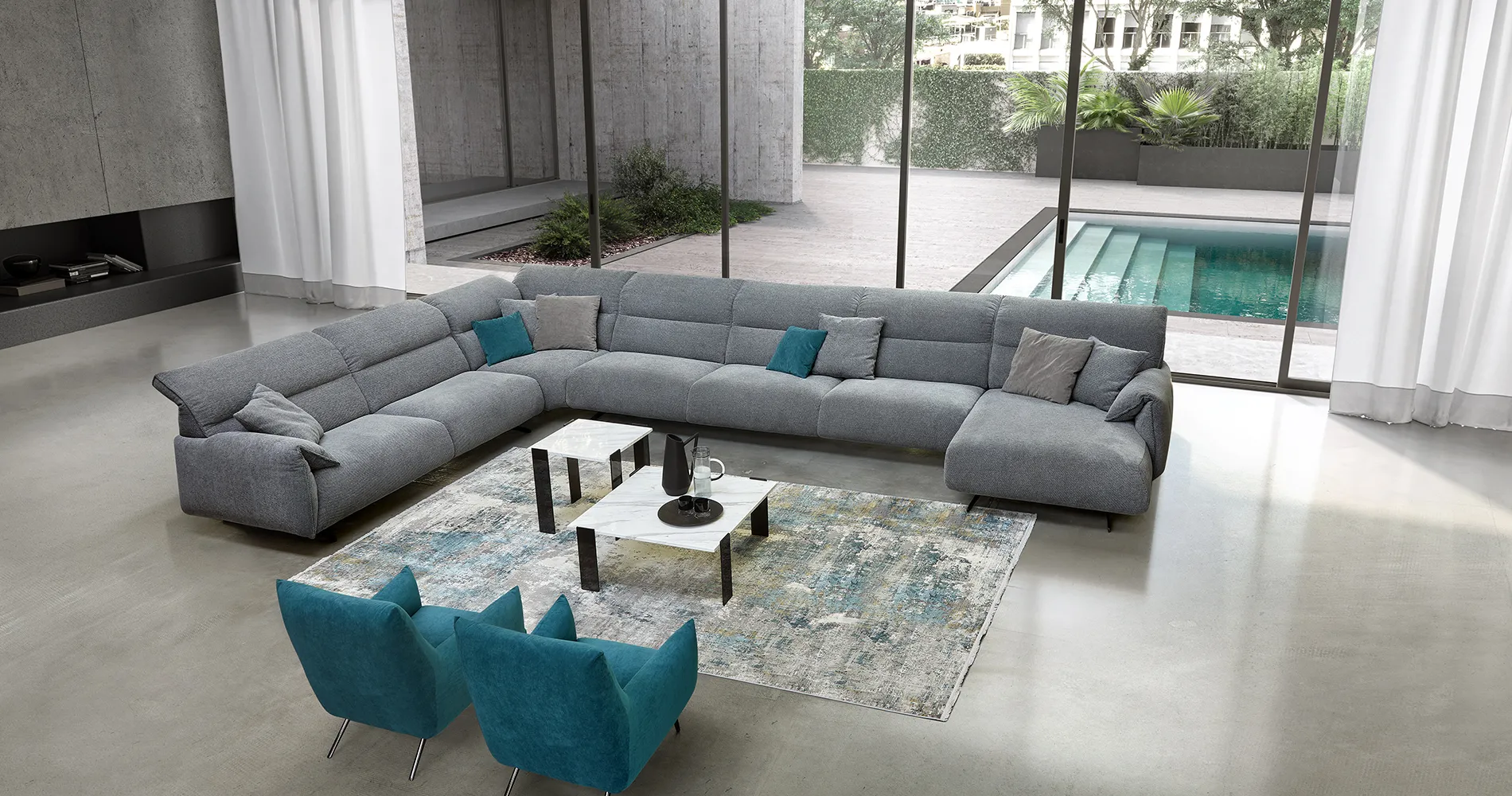 Divano angolare Cardiff Rosini grigio con penisola e poltrone azzurre