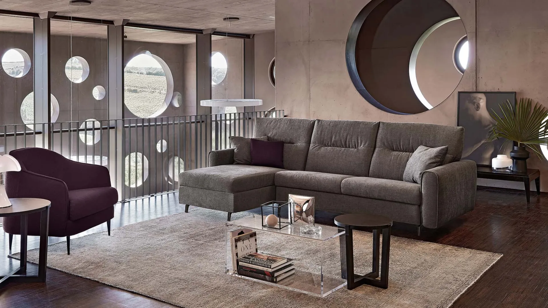 Divano letto Stelvio Rosini grigio con penisola e poltrona viola