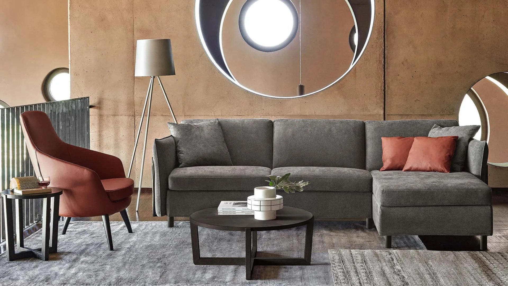 Divano letto Venezia Rosini grigio con penisola e poltrona rossa
