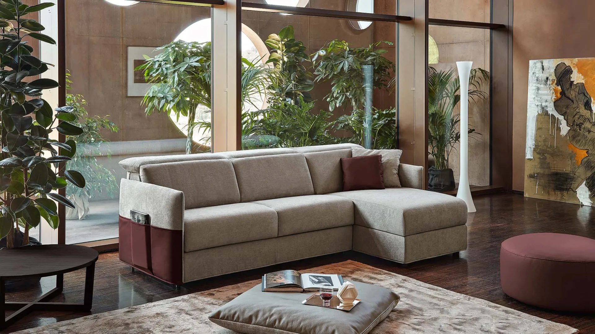 Divano letto Verona Rosini con penisola e fianchi in pelle bordeaux