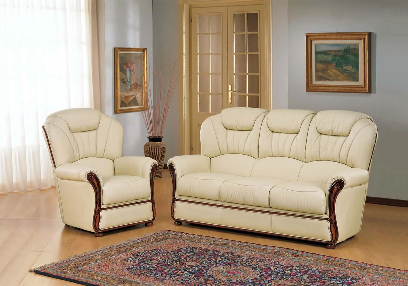 Divano classico Nadia Rosini tre posti in pelle crema con poltrona