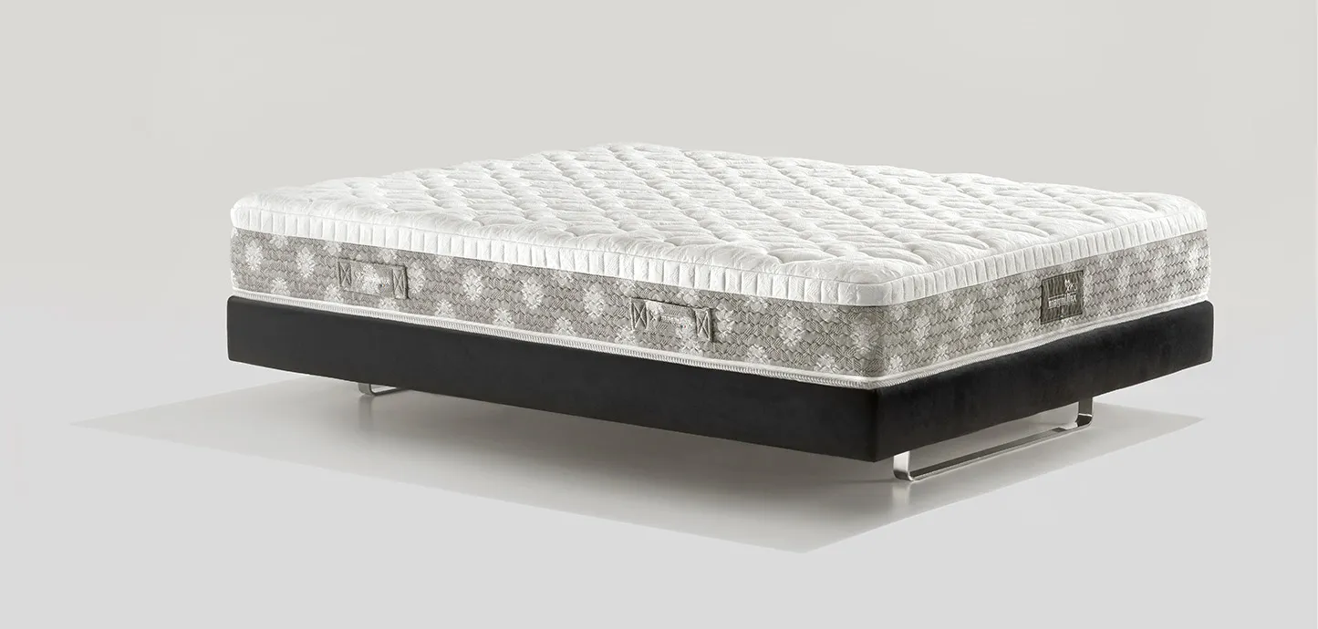 Materasso DolceVita Dual 10 Magniflex di tre quarti, con fascia grigia decorata