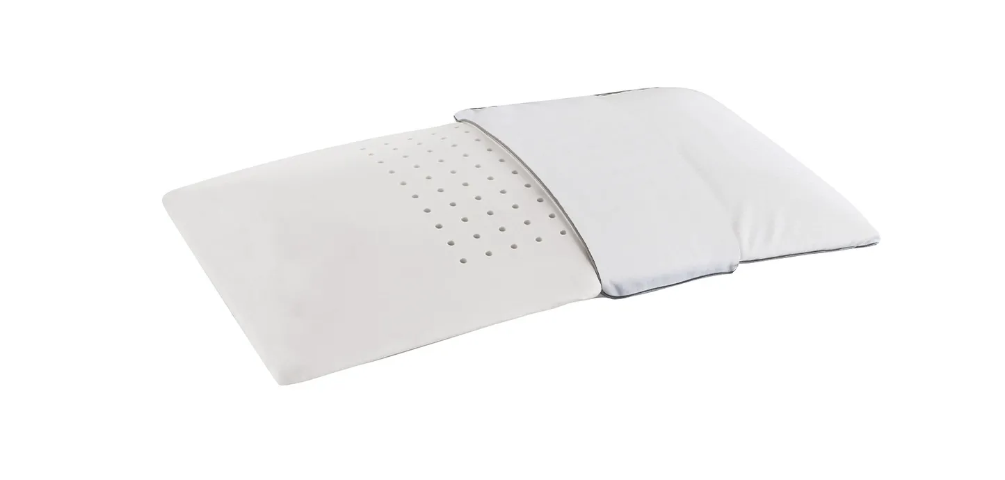 Guanciale Superiore Flat Magniflex con la fodera aperta sulla lastra forata