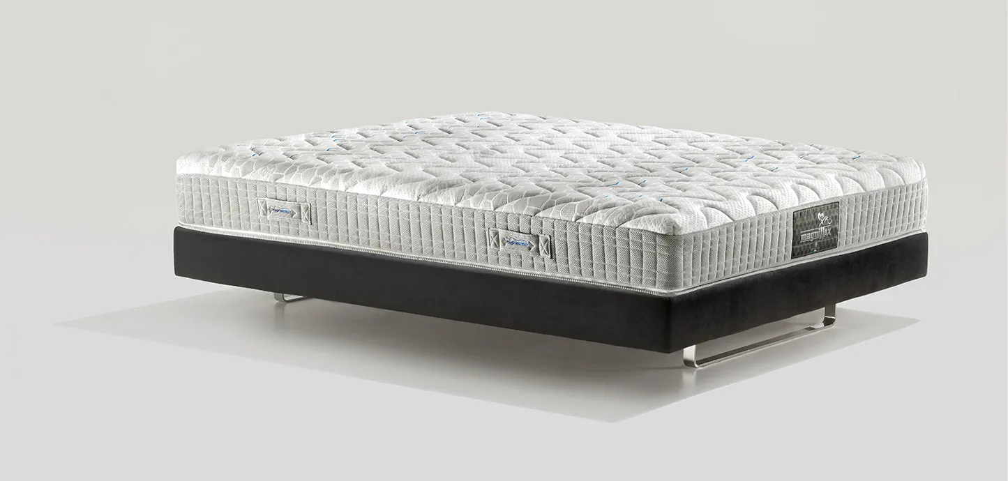 Materasso MagniStretch 9 Magniflex di tre quarti su base letto scura