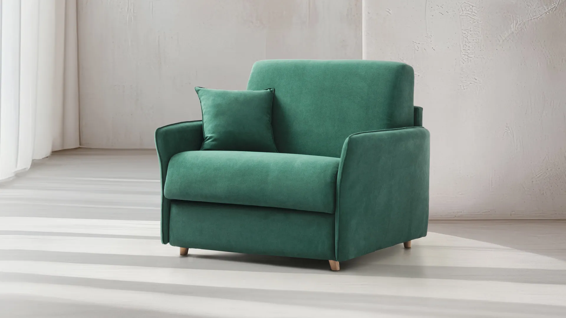 Poltrona letto Zara Basic Aerre Divani verde con cuscino, su fondo chiaro