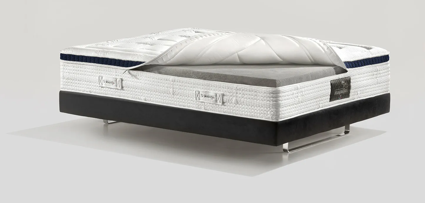 Materasso Audace Hybrid 12 Magniflex con la fodera aperta sulla lastra grigia in Memoform