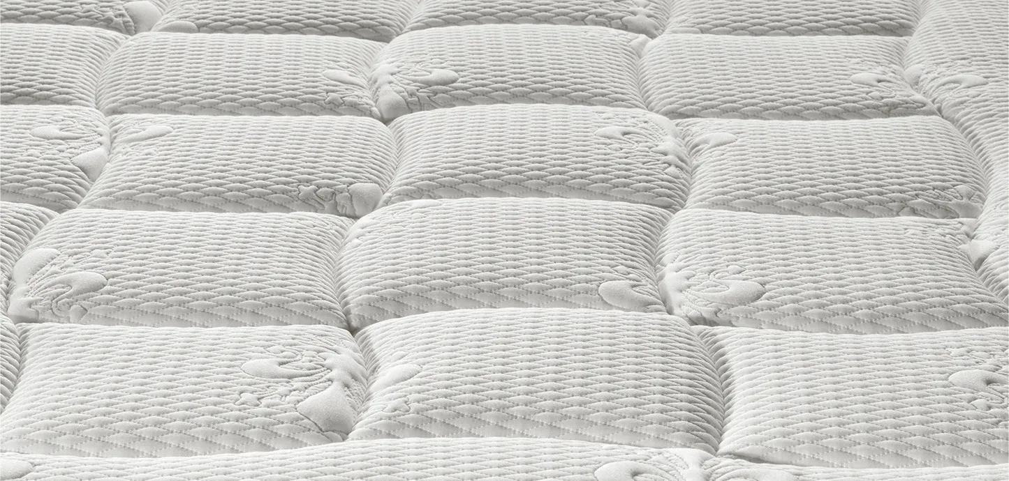 Dettaglio del piano trapuntato del materasso a molle Audace Hybrid 12 Magniflex