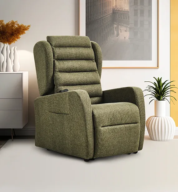 Poltrona relax Chanel Aerre Divani verde oliva in un soggiorno con quadro