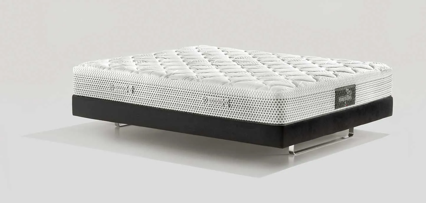 Materasso Massaggio Deluxe Magniflex bianco di tre quarti, con fascia a rete traspirante