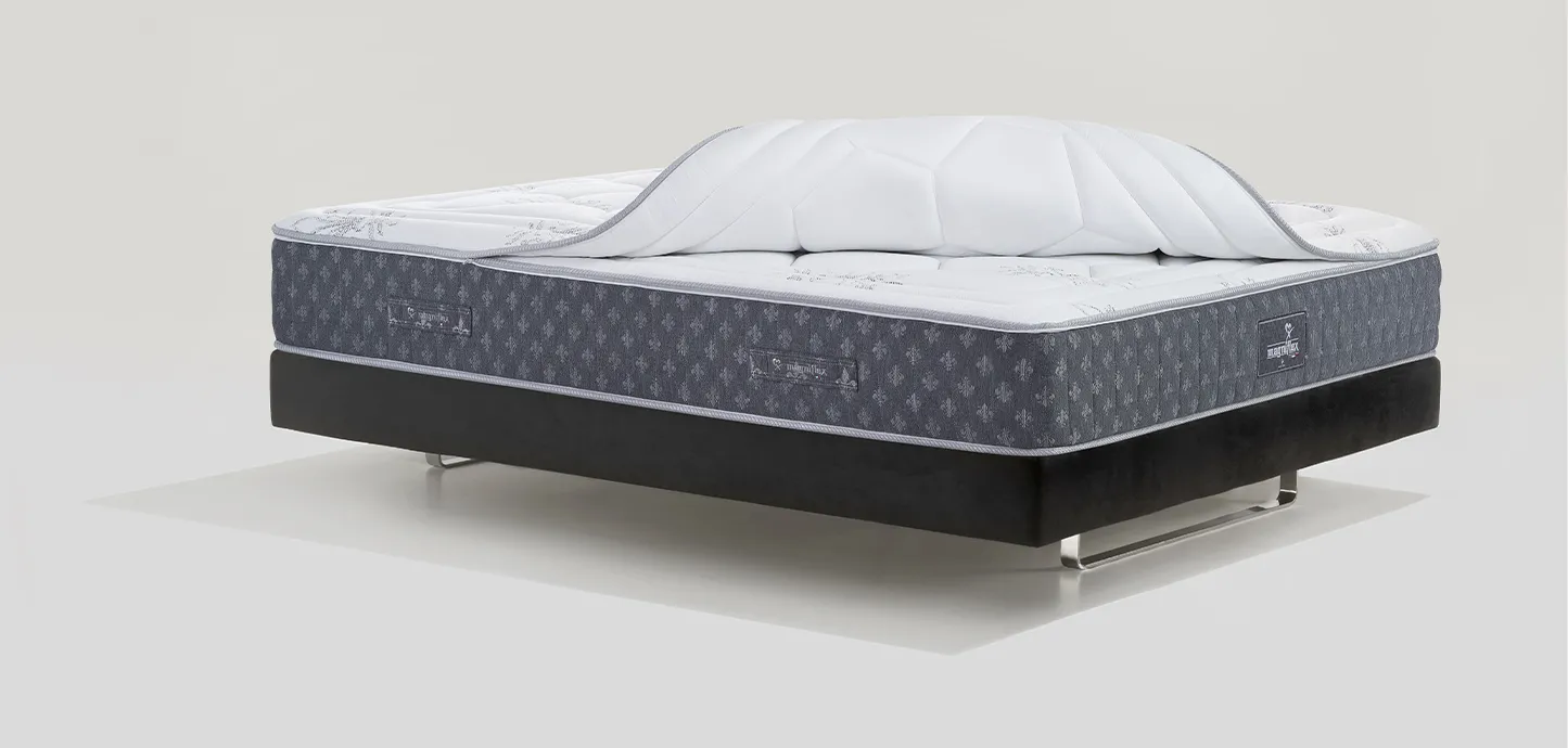 Materasso a molle Sonno Infinity Magniflex con il topper removibile sollevato al centro
