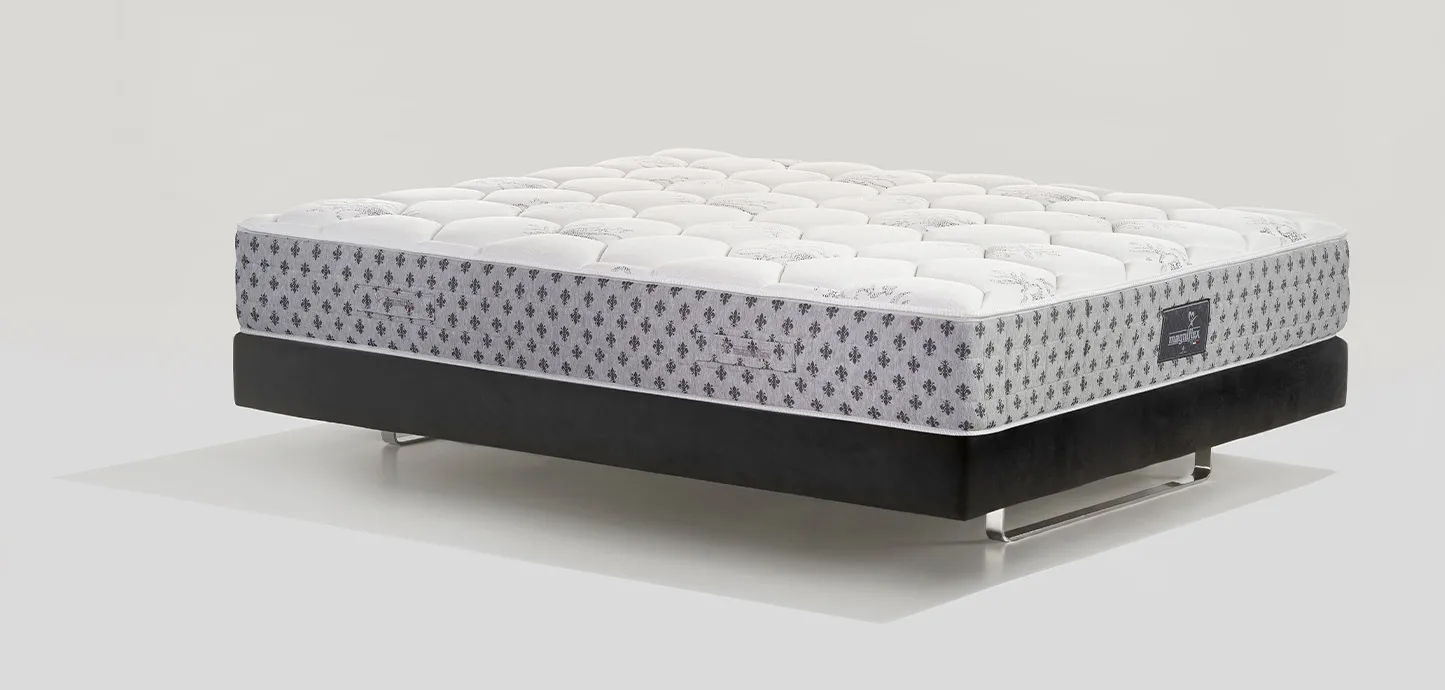 Materasso a molle Sonno Vital Magniflex con fascia grigia a piccoli rombi, di tre quarti