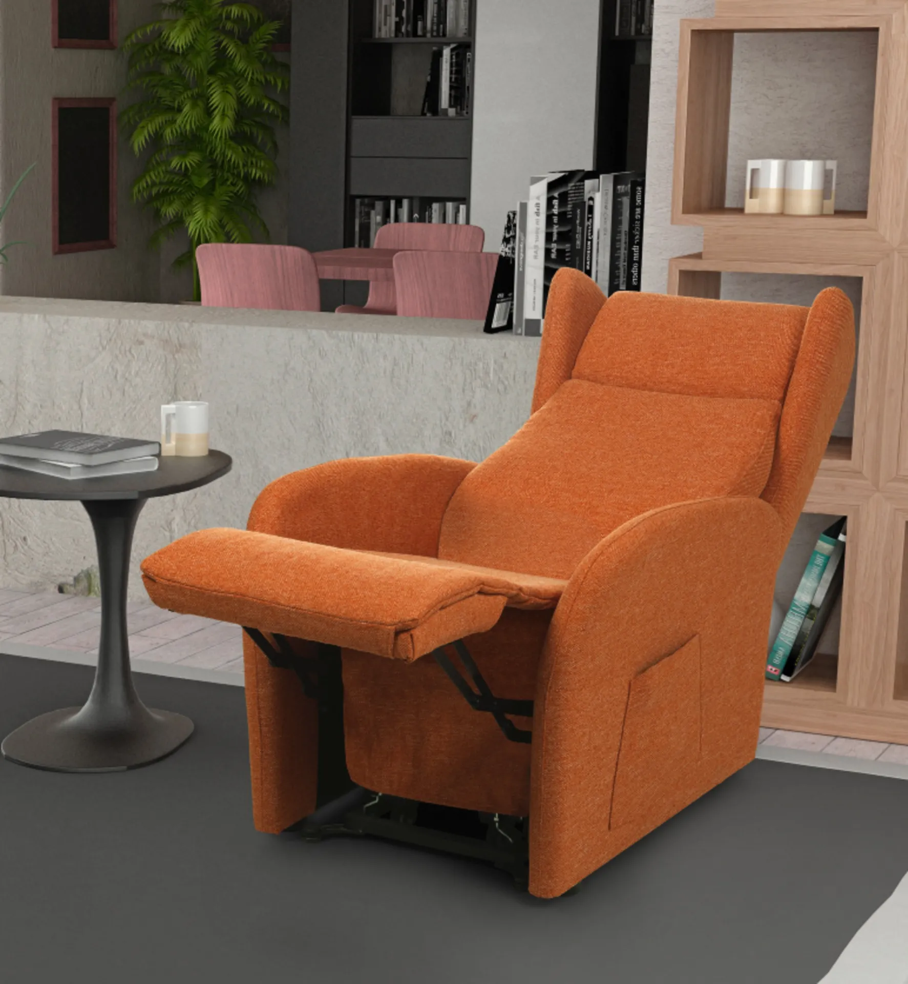 Poltrona alzapersona Dolly Brima Italia arancio aperta in un soggiorno con libreria
