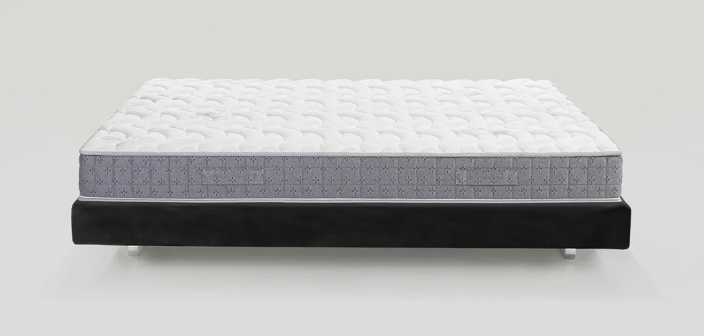 Materasso Riposo 8 Magniflex visto dal lato lungo su base letto scura