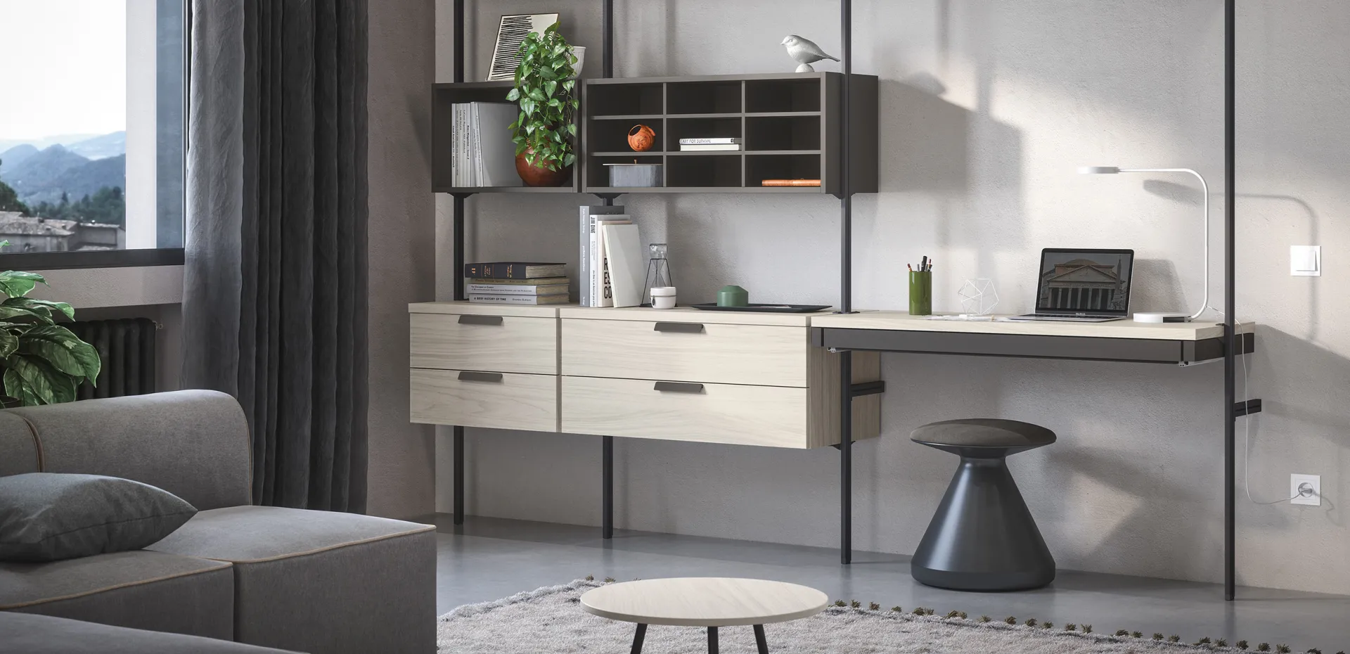 Pouf Tokyo Cinquanta3 scuro accanto alla scrivania sospesa in soggiorno